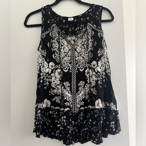 Sleeveless black and white floral top